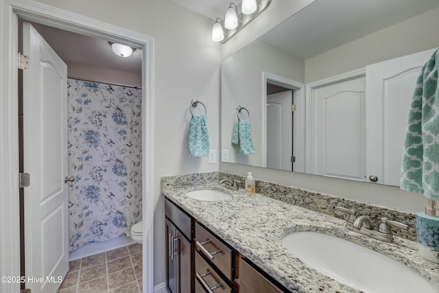 full bathroom with tile patterned floors, vanity, toilet, and shower / bath combo