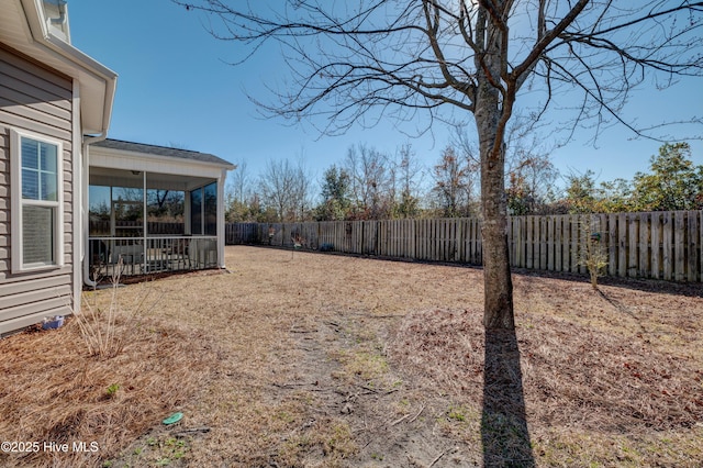 view of yard with a sunroom