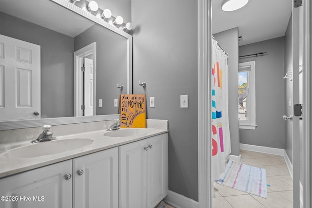 bathroom featuring tile patterned floors, a shower with shower curtain, and vanity