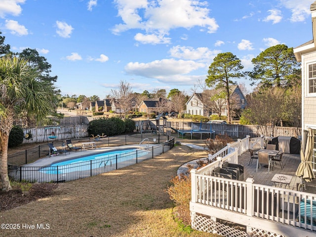 view of pool featuring a trampoline