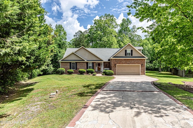 craftsman-style house featuring a front lawn, driveway, an attached garage, and brick siding