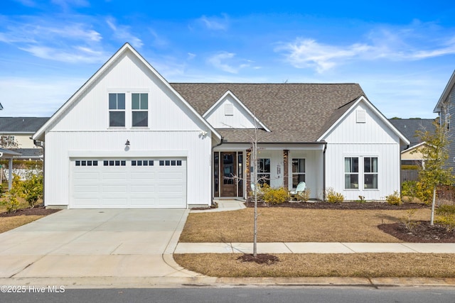 modern farmhouse style home with driveway, board and batten siding, and roof with shingles