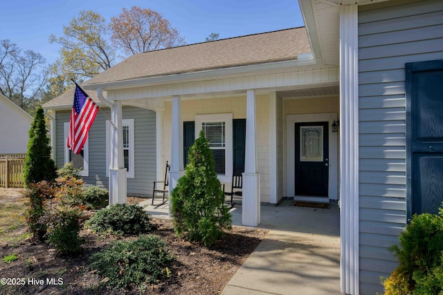 doorway to property with a porch