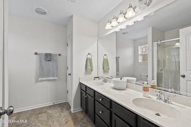 bathroom with walk in shower, vanity, and toilet