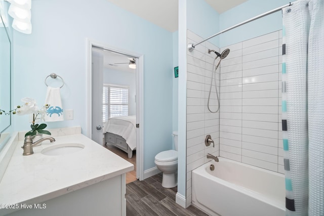 ensuite bathroom with shower / bathtub combination with curtain, toilet, connected bathroom, vanity, and wood finished floors