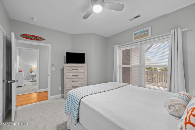 carpeted bedroom with ceiling fan