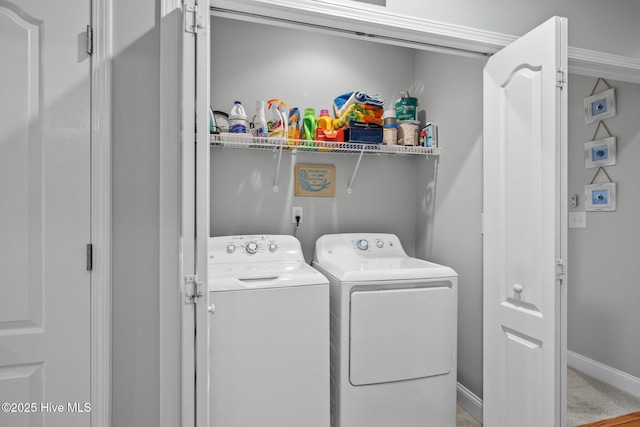 laundry room with independent washer and dryer