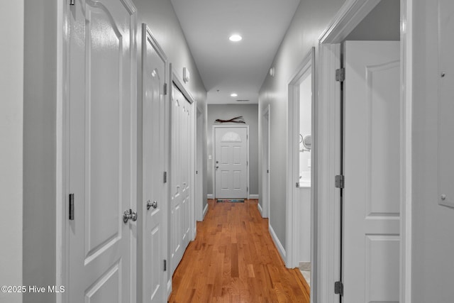 hall featuring light wood-type flooring