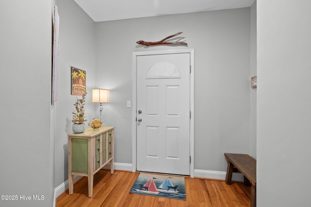 foyer with light hardwood / wood-style floors