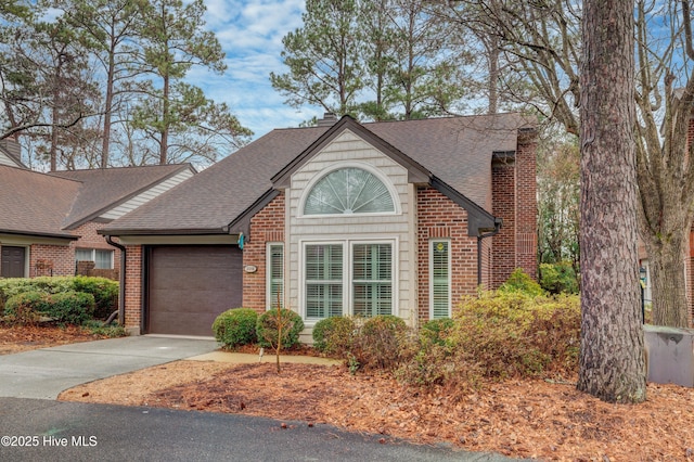 view of front of property with a garage