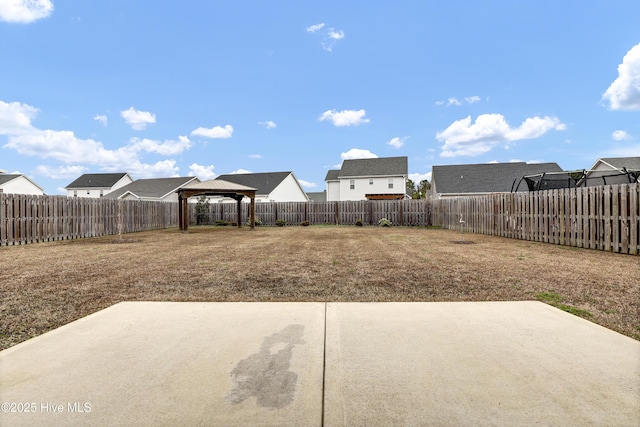 view of yard featuring a gazebo and a patio