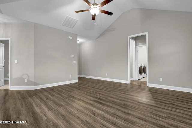 unfurnished living room with separate washer and dryer, dark wood-type flooring, lofted ceiling, and ceiling fan