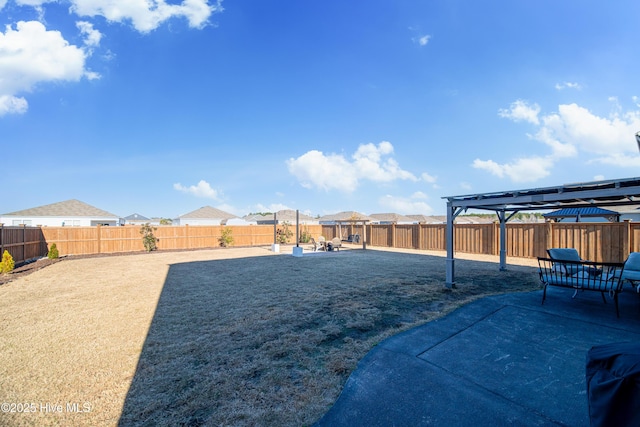 view of yard featuring a patio area and a pergola