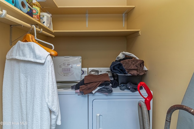 laundry room with washing machine and dryer