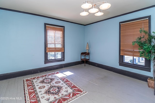 unfurnished room featuring crown molding