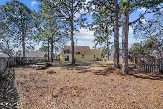 view of yard with a fenced backyard