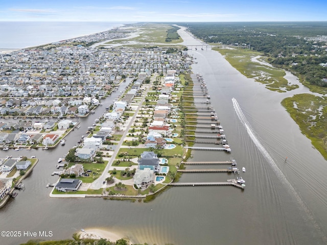57 Craven St, Ocean Isle Beach, NC 28469 - aerial view of property's location featuring a nearby body of water and nearby suburban area