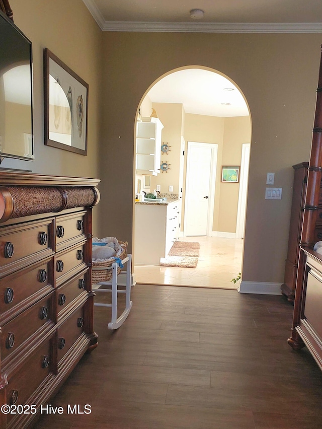 57 Craven St, Ocean Isle Beach, NC 28469 - corridor with arched walkways, dark wood-type flooring, and ornamental molding