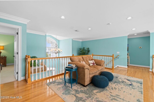 57 Craven St, Ocean Isle Beach, NC 28469 - living area featuring a chandelier, ornamental molding, recessed lighting, and wood finished floors