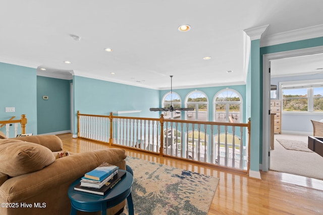 57 Craven St, Ocean Isle Beach, NC 28469 - living room with a ceiling fan, crown molding, recessed lighting, and wood finished floors