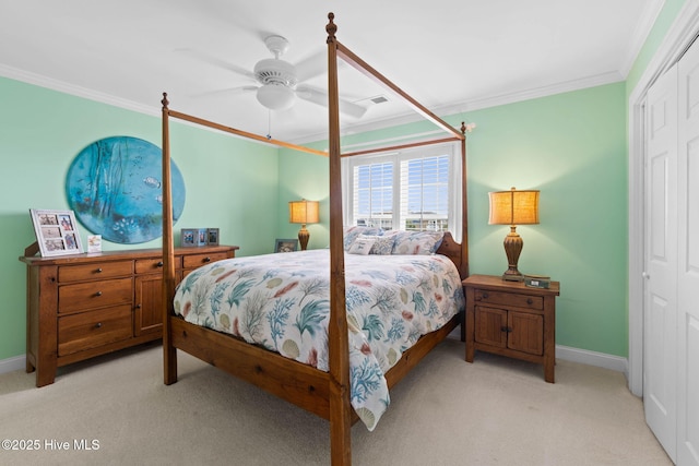 57 Craven St, Ocean Isle Beach, NC 28469 - bedroom with ornamental molding, a closet, light colored carpet, and ceiling fan