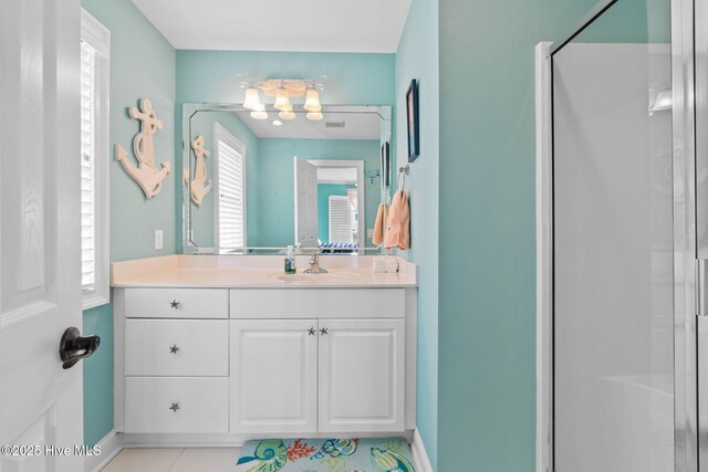 57 Craven St, Ocean Isle Beach, NC 28469 - bathroom featuring a stall shower, vanity, and a chandelier