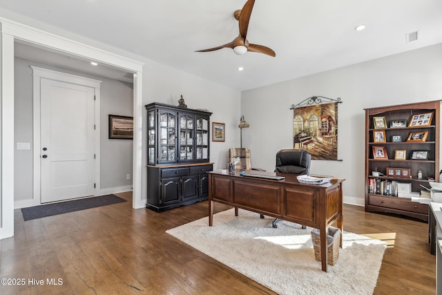 office area with dark hardwood / wood-style floors and ceiling fan