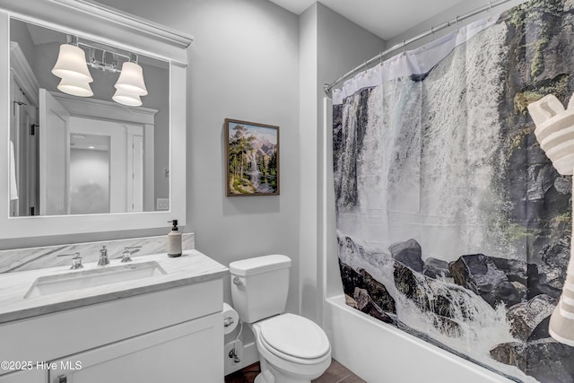 full bathroom featuring vanity, toilet, and shower / bathtub combination with curtain