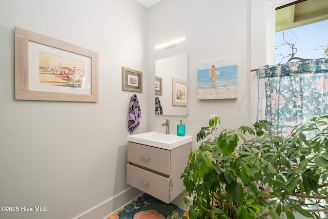 530 Contentnea Ave, New Bern, NC 28560 - bathroom with vanity and baseboards