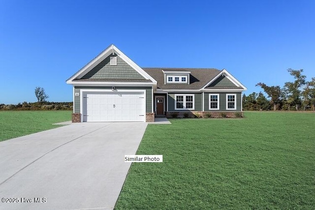 craftsman house with a garage and a front yard