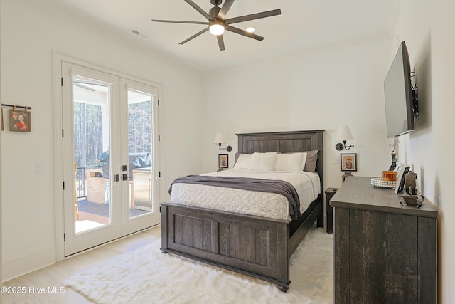 bedroom with access to exterior, visible vents, ceiling fan, light wood-type flooring, and baseboards