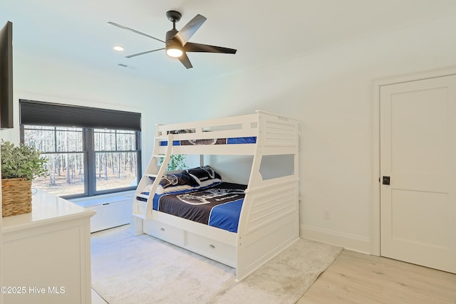 bedroom with baseboards, visible vents, a ceiling fan, light wood-type flooring, and recessed lighting