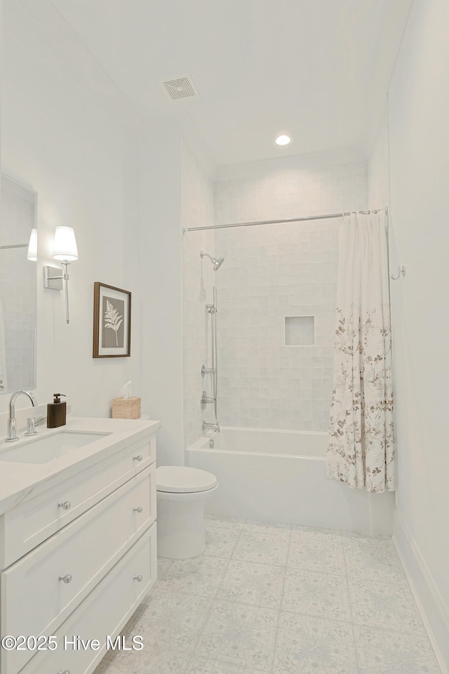 full bath with toilet, shower / tub combo, visible vents, and vanity