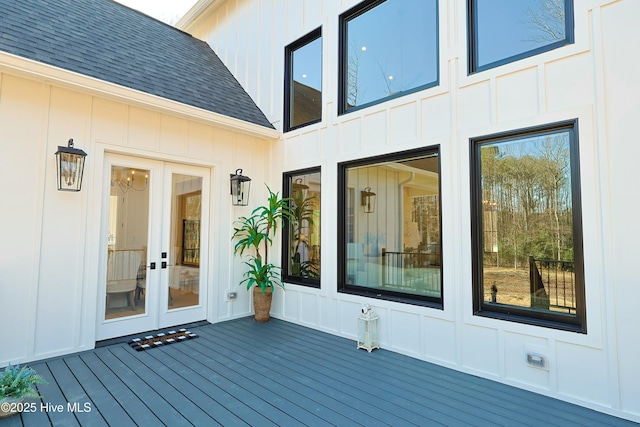 wooden deck featuring french doors