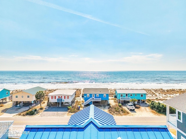 view of water feature with a beach view