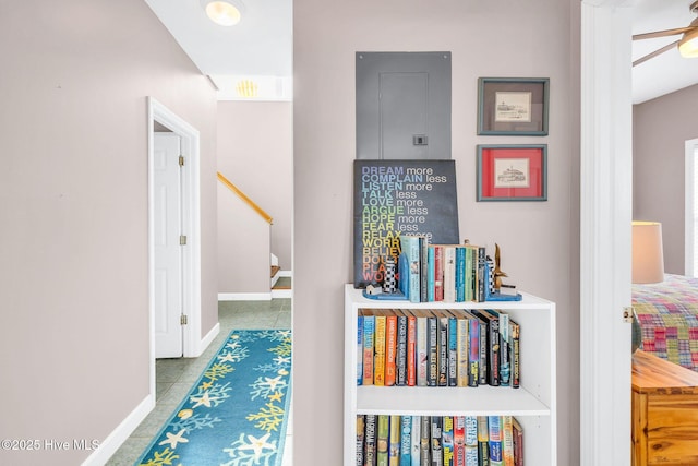 corridor featuring light tile patterned floors