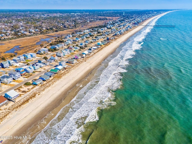 aerial view featuring a water view and a beach view