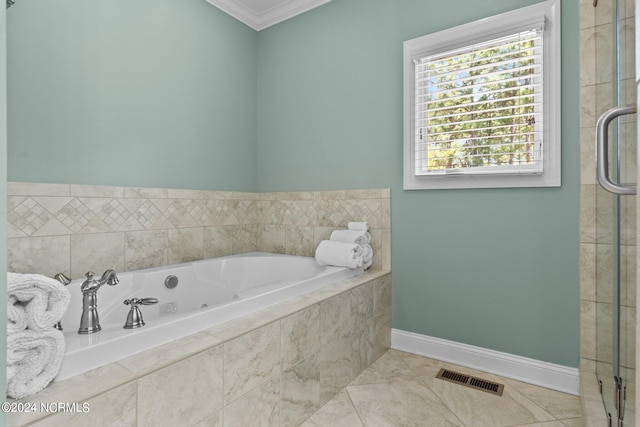 bathroom with independent shower and bath and crown molding