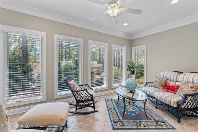 living room with ornamental molding, light tile patterned floors, and ceiling fan