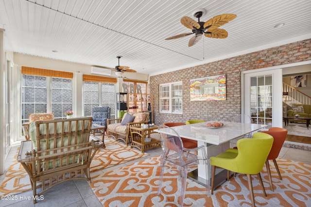 sunroom / solarium with ceiling fan, a wall mounted AC, and wooden ceiling