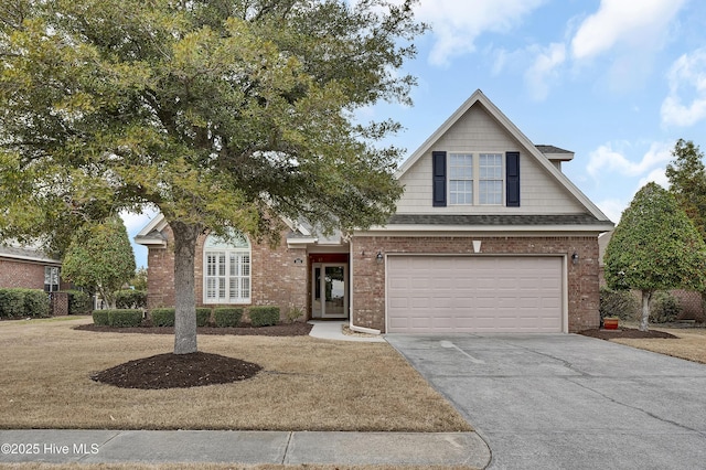 view of front of property featuring a shingled roof, concrete driveway, brick siding, and an attached garage