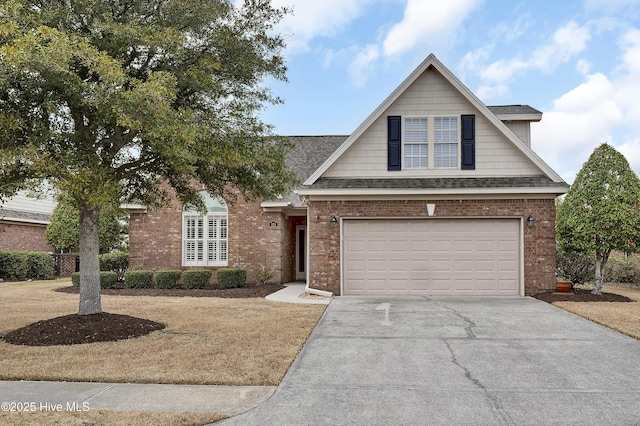 view of front facade with a shingled roof, concrete driveway, brick siding, and a garage