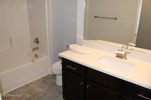 full bathroom featuring  shower combination, vanity, and toilet