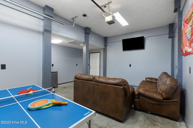 rec room featuring concrete flooring