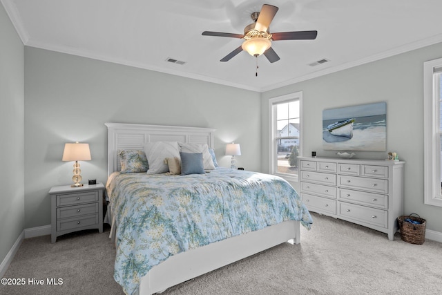 bedroom featuring light carpet, ornamental molding, visible vents, and baseboards