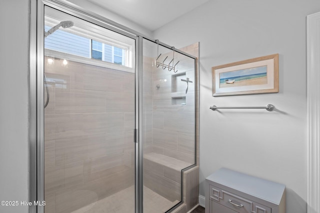 bathroom featuring a stall shower