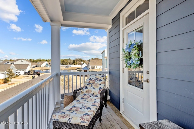 balcony featuring a residential view