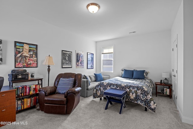 bedroom featuring light carpet and visible vents