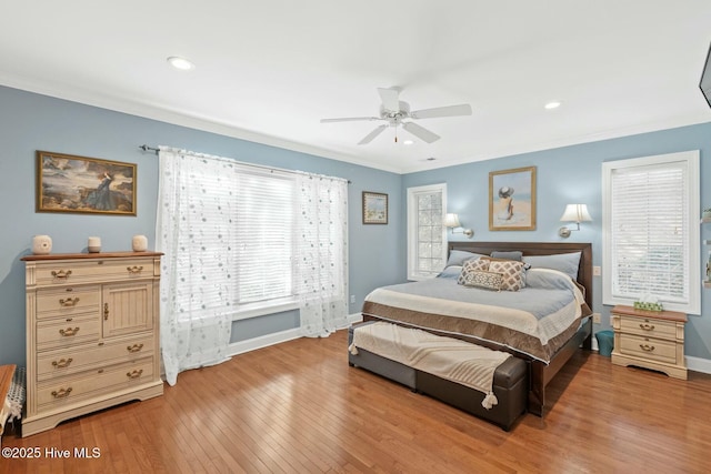 bedroom with baseboards, recessed lighting, ceiling fan, light wood-style floors, and crown molding