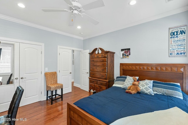 bedroom featuring recessed lighting, a ceiling fan, wood finished floors, and crown molding